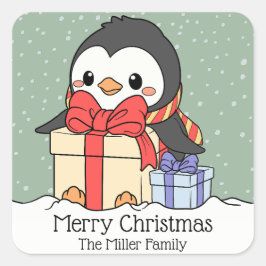 Niedlicher Pinguin mit Weihnachtsgeschenken im Sch Quadratischer Aufkleber