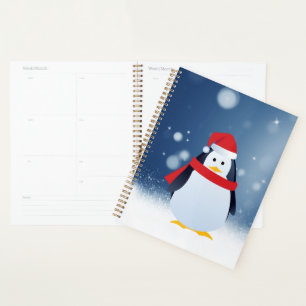 Niedlicher Pinguin w Rote Weihnachtsmannmütze Weih Planer
