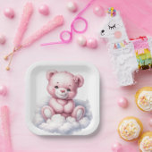 NIEDLICHER PINK-TEDDY-BAR, DER AUF EINEM KLOUTEN S PAPPTELLER (Party)