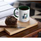 Niedlicher Puffsack in blauem Wasser Zweifarbige Tasse