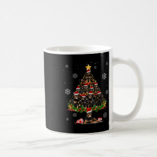 Niedlicher Rottweiler Hund liebt Weihnachtsbaumleu Kaffeetasse