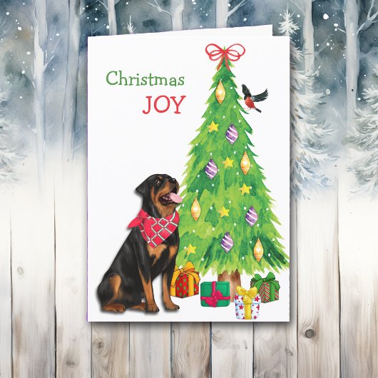 Niedlicher Rottweiler, Vogel und Weihnachtsbaum Feiertagskarte