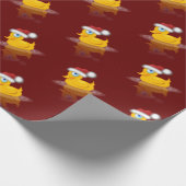Niedlicher Santa Rubber Ente auf dunkelrotem Hinte Geschenkpapier (Ecke)