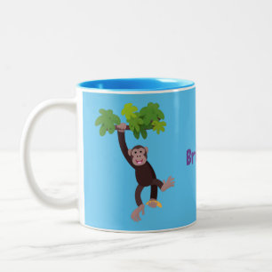 Niedlicher Schimpanse im Dschungel hängender Carto Zweifarbige Tasse