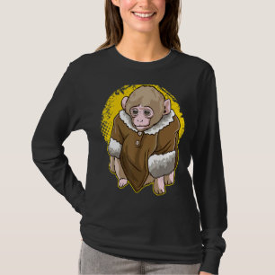 Niedlicher schneebedeckter Affe mit einem Meme T-Shirt