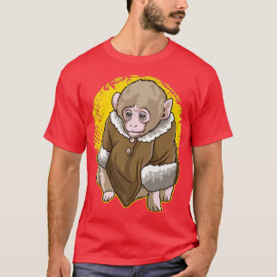 Niedlicher schneebedeckter Affe mit einem Meme T-Shirt