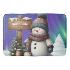 Niedlicher Schneemann am Nordpol mit Nordlichter Badematte