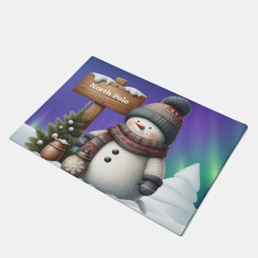 Niedlicher Schneemann am Nordpol mit Nordlichter Fußmatte (Schrägansicht)