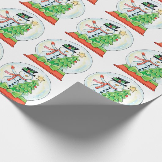 Niedlicher Schneemann in einem Schneeglobe mit Wei Geschenkpapier (Ecke)