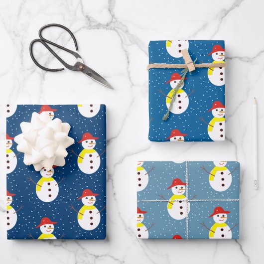 Niedlicher Schneemann und blauer Schnee Geschenkpapier Set (Vorderseite)