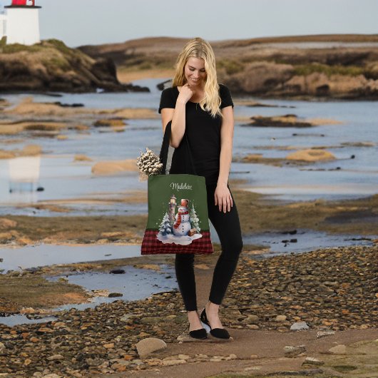 Niedlicher Schneemann und Leuchtturm auf Kariertem Tasche