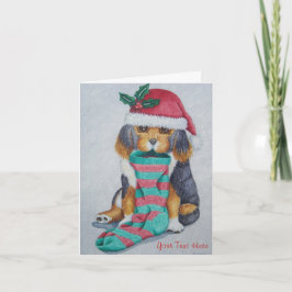 niedlicher, schwarz-brauner Welpe, zu Weihnachten 