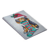 niedlicher, schwarz-brauner Welpe, zu Weihnachten Notizblock (Rechte Seite)