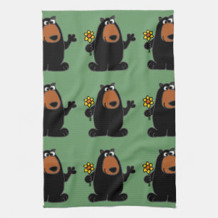 Niedlicher schwarzer Bär mit Narzissen-Cartoon Küchentuch