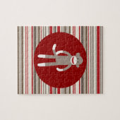 Niedlicher Sockenaffe auf roten, roten, braunen St Puzzle (Horizontal)