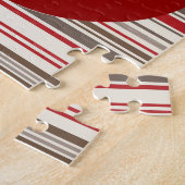 Niedlicher Sockenaffe auf roten, roten, braunen St Puzzle (Seite)