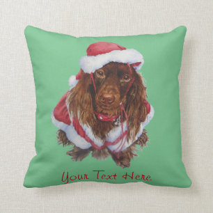Niedlicher Spaniel-Hund zu Weihnachten gekleidet Kissen