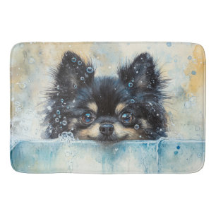 Niedlicher Spitz Hund in der Badewanne Badematte