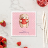 Niedlicher Teddybär, der ein Valentinisches Rotes  Serviette (Beispiel)