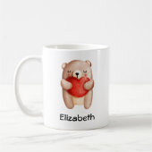 Niedlicher Teddybär mit einem roten Herz Kaffeetasse (Links)