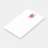 Niedlicher Teddybär mit einem roten Herz Post-it Klebezettel (angewinkelt)