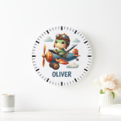 Niedlicher Trex Dinosaurier mit einem blauen Flugz Große Wanduhr (Zuhause)