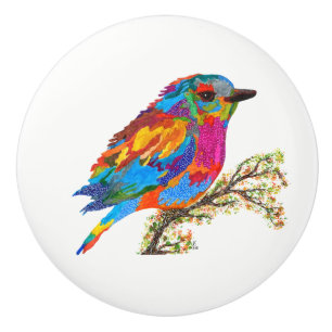 Niedlicher und farbenfroher Vogel an einem Knotenp Keramikknauf