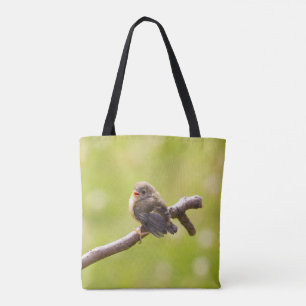 Niedlicher Vogel, der an einem Sommertag fröhlich  Tasche