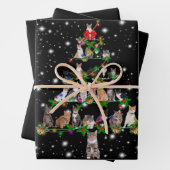 Niedlicher Weihnachtsbaum der Katze, gedeckt durch Geschenkpapier Set (Beispiel)