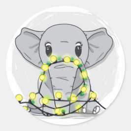 Niedlicher Weihnachtselefant in Licht verpackt Runder Aufkleber