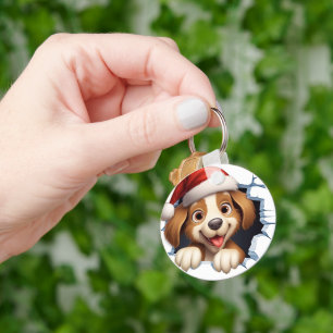 Niedlicher Weihnachtshund durch die Mauer illustri Schlüsselanhänger