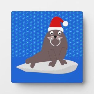 Niedlicher Weihnachtswalrus und Schneeflocken Fotoplatte