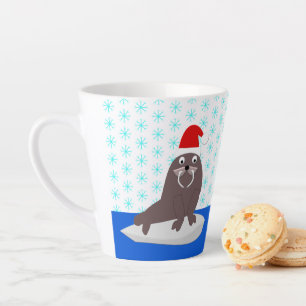 Niedlicher Weihnachtswalrus und Schneeflocken Milchtasse