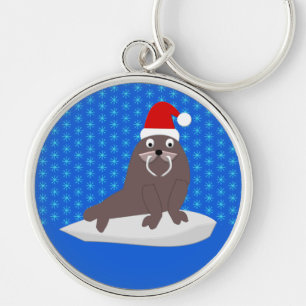 Niedlicher Weihnachtswalrus und Schneeflocken Schlüsselanhänger