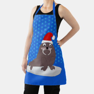 Niedlicher Weihnachtswalrus und Schneeflocken Schürze