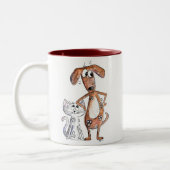 Niedlicher, weißbrauner Hund und graue Katze Zweifarbige Tasse (Links)