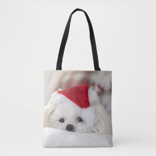 Niedlicher Weißhund in einem Red Christmas Hat Tasche
