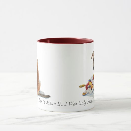 Niedlicher Welpe mischte Zucht mit Tasse (Zentrum)