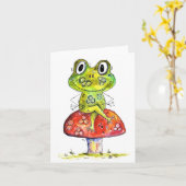 Niedlicher Whimsical Green Frosch auf Toadstool Karte (Gelbe Blume)
