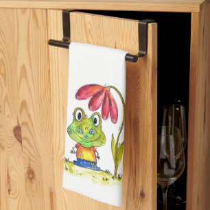 Niedlicher Whimsical Green Frosch unter einer rote Geschirrtuch