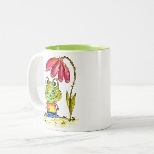 Niedlicher Whimsical Green Frosch unter einer rote Zweifarbige Tasse (Vorderseite Links)