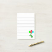 Niedlicher, wütender Dino mit Party-Balloons, die  Post-it Klebezettel (Auf Schreibtisch)