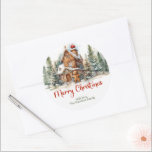 Niedliches Aquarellhaus Winterwald Runder Aufkleber<br><div class="desc">Klassische zeitlose Aquarellbild im Weihnachtsbäckerhaus im Winterwald mit Kiefern und roten Heiligbeeren. Elegantes rotes Drehbuch "Frohe Weihnachten". Personalisieren Sie den Text einfach. Violetdrucke ©</div>