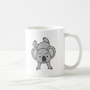 Niedliches Baby Koala mit einem Lächeln auf einem Kaffeetasse