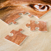 Niedliches Baby-Orang-Utan sieht auf Wunder aus Puzzle (Seite)