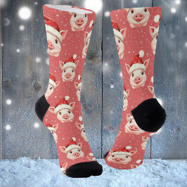 Niedliches Baby Pig in Weihnachtsmannmütze Socken