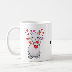 Niedliches Bunny Rabbit Umarmung mit dem Hearts In Kaffeetasse