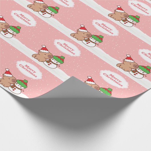 Niedliches Capybara und Schneemannsfest Geschenkpapier (Ecke)