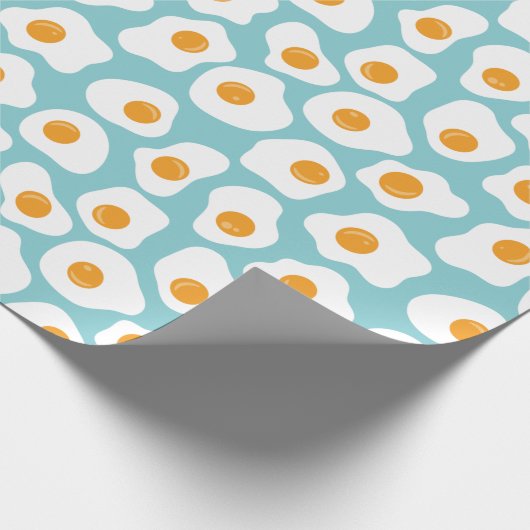 Niedliches Ei-Jolk-Muster in Aquamarin blau Geschenkpapier (Ecke)