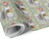 Niedliches Eichhörnchen in Weihnachtsmannmütze mit Geschenkpapier (Rolleneckpunkt)